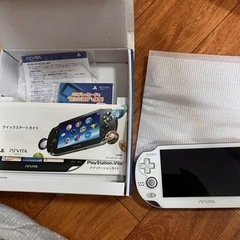 PS Vita と ソフト5本の画像
