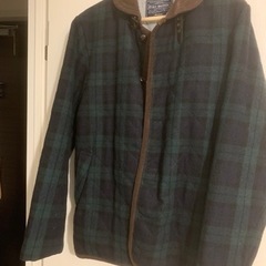 緑のチェック アウターの画像