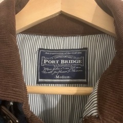 緑のチェック アウターの画像