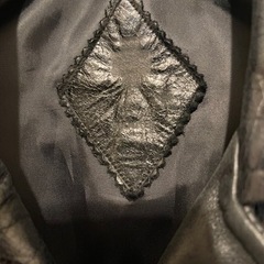 黒色レザーコートの画像