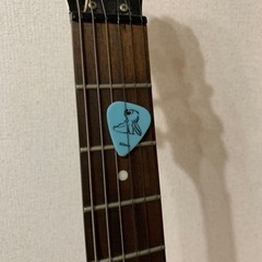 エレキギター(スタンド付き、ケースなし)の画像