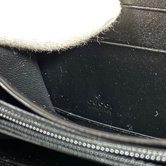 GUCCI グッチ エンボスロゴ GG柄 長財布 ラウンドファスナー モノグラムの画像