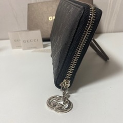 GUCCI グッチ エンボスロゴ GG柄 長財布 ラウンドファスナー モノグラムの画像