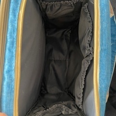 マザーズバッグ 持ち運びベビーベッドの画像