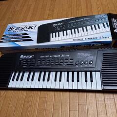 値下げエレクトリックキーボードの画像