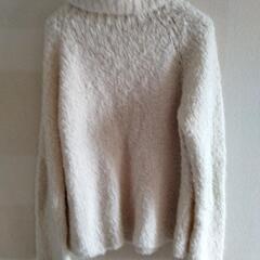 白いセーターの画像