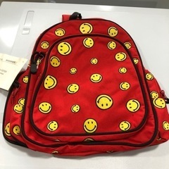 未使用品　ニコちゃん　リュックサック　イエロー　レッド　キュート　超お買得‼︎   人気商品　在庫限り‼︎の画像
