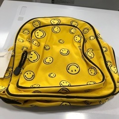未使用品　ニコちゃん　リュックサック　イエロー　レッド　キュート　超お買得‼︎   人気商品　在庫限り‼︎の画像