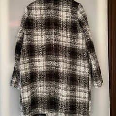 人気のチェック柄　コートの画像