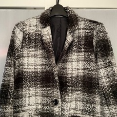 人気のチェック柄　コートの画像