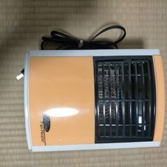 AMF-704S　スケルトンカラー(ライトオレンジ)　ミニファンヒーターの画像