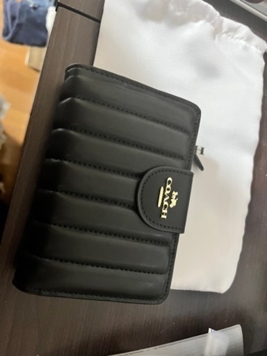 新品未使用　Coach  二つ折り財布