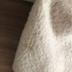 白のロングコートの画像