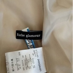 白のダウンの画像