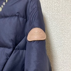 紺　コートの画像