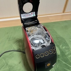 (お話中の為一時停止)バリスタのコーヒーメーカーの画像