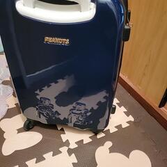 スヌーピーのキャリーバッグの画像