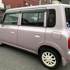 ⭐️全込み超特価‼️⭐️車検2年付き‼️⭐️実走行9万km‼️⭐️タイミングチェーンエンジン‼️⭐️安心の修復歴無し‼️⭐️可愛くてお洒落なピンク＆ホワイトのアルトラパン☆コラムAT(4AT)☆電動格納式ドアミラー☆キーレス☆アルミホイール☆プライバシーガラス☆ETC☆Bluetooth♪『車検代も、月割り自動車税も、リサイクル料も、全てコミコミの超特価』‼️『更に千葉＆成田ナンバー管轄は名変代行無料サービス』‼️『圧倒的な安さ』‼️『超激安早い者勝ち』‼️の画像