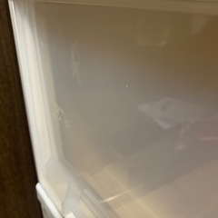 衣装ケースと物干し竿2本の画像
