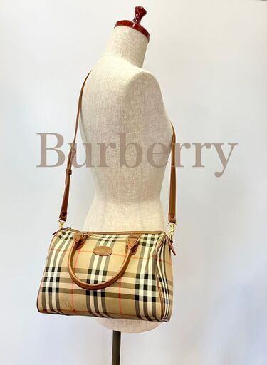 ブランド：バーバリー　BURBERRY 商品名：2way ミニ　ボストンバッグ　ハンドバッグ　ショルダー カラー：ベージュ　ブラウン　ノバチェック 素材：キャンバス×レザー サイズ：約W24×H17.5×D15㎝  ハンドル長さ：約35cm ショルダー：約93.5-107㎝ ※手採寸の為、多少の誤差はご了承ください。  付属品：ショルダーストラップ 管理番号：D-md5311  【商品状態】 使用に伴うスレ小傷があります。 気になる箇所は撮影しておりますので画像でご確認お願いいたします。 見たい箇所があり