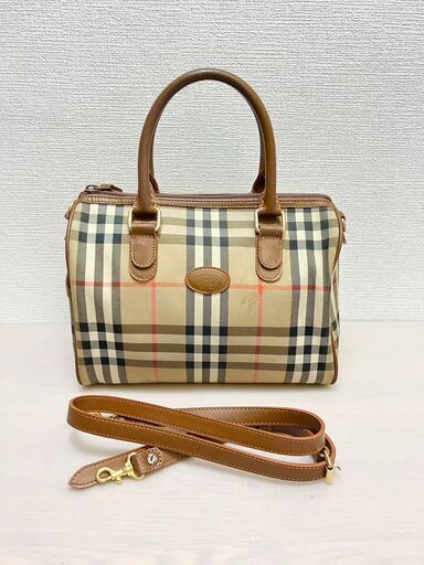 ブランド：バーバリー　BURBERRY 商品名：2way ミニ　ボストンバッグ　ハンドバッグ　ショルダー カラー：ベージュ　ブラウン　ノバチェック 素材：キャンバス×レザー サイズ：約W24×H17.5×D15㎝  ハンドル長さ：約35cm ショルダー：約93.5-107㎝ ※手採寸の為、多少の誤差はご了承ください。  付属品：ショルダーストラップ 管理番号：D-md5311  【商品状態】 使用に伴うスレ小傷があります。 気になる箇所は撮影しておりますので画像でご確認お願いいたします。 見たい箇所があり