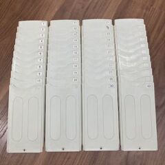Maxタイムレコーダーとラックの画像
