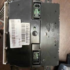 R56ミニ後期用純正オーディオとエアコンパネルの画像