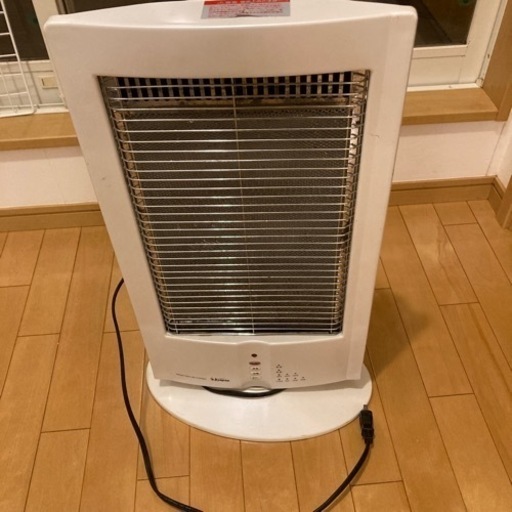 お話し中　電気ストーブ