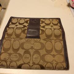 COACH紫色財布の画像