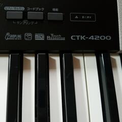 CASIO キーボード【スタンド、折り畳みイス付き】の画像