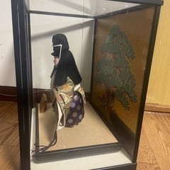 翁人形の画像