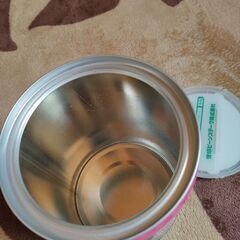 空き缶　粉ミルク缶の画像