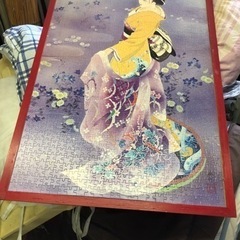 黄色い和服を着た女性のパズルです。の画像