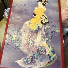 黄色い和服を着た女性のパズルです。の画像