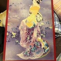 黄色い和服を着た女性のパズルです。の画像