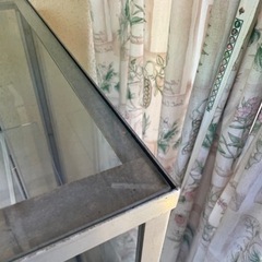 再〕ガラスケースの画像