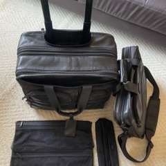 TUMI キャリー 黒レザー WHEELED DELUXE EXPANDABLE