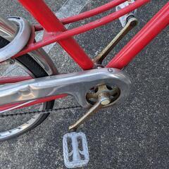 赤い自転車です。の画像