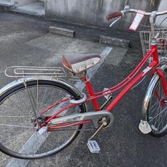 赤い自転車です。の画像
