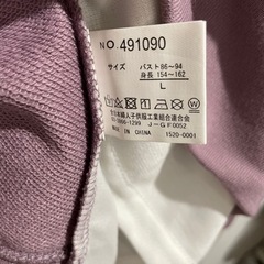 新品試着のみ トップス L 重ね着風の画像
