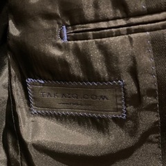 黒系スーツになります。の画像