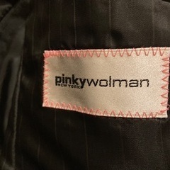 黒系スーツになります。の画像