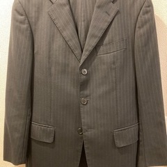 黒系スーツになります。の画像
