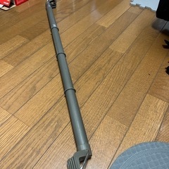 交渉中車載ハンガーをかけるポール？の画像