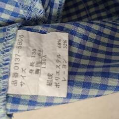 女児エプロン(約120〜130cm)とハンガーの画像