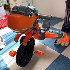 恐竜の三輪車の画像