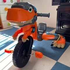 恐竜の三輪車の画像