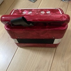 オモチャ　アコーディオンの画像