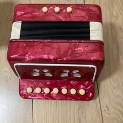 オモチャ　アコーディオンの画像