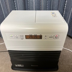 白い灯油ストーブ